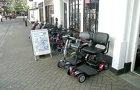 Mobility Scooters outside a shop