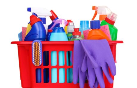 Cleaning items in red plastic basket