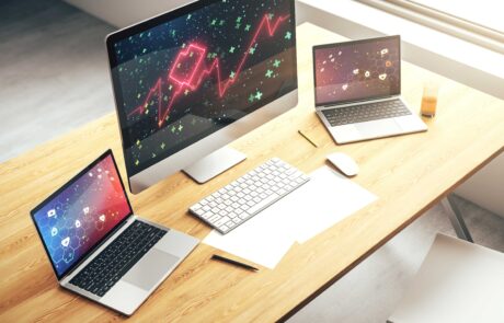 Desktop and laptop computers on desk