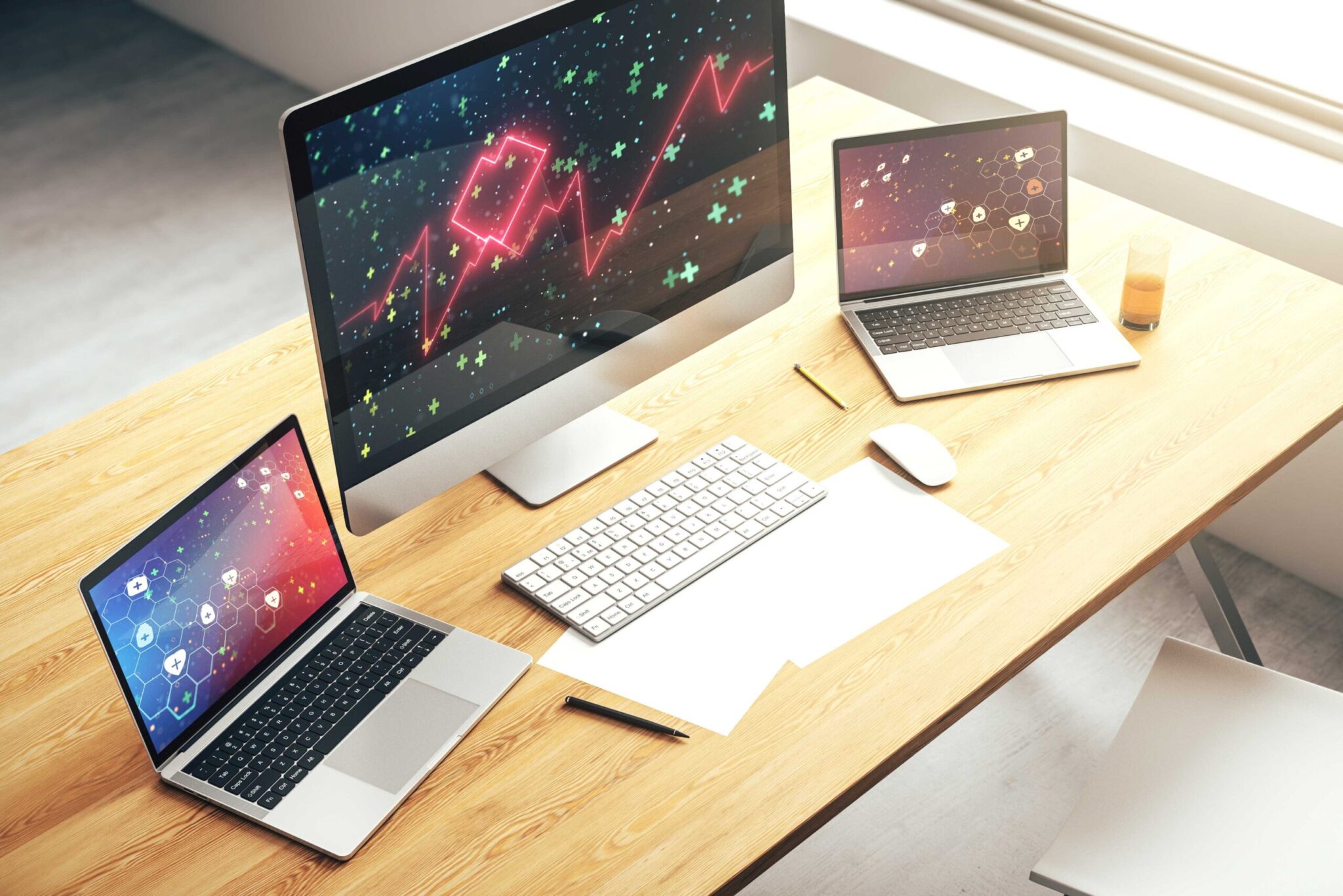 Desktop and laptop computers on desk